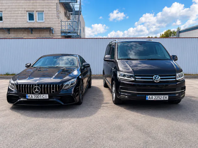 Mercedes-Benz S-Class coupe and Volkswagen Multivan at the KTrans yard